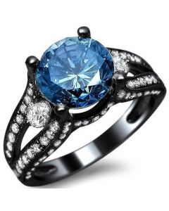Black ring with blue diamond 2025